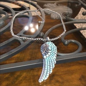 Necklace with angel wing medallion
